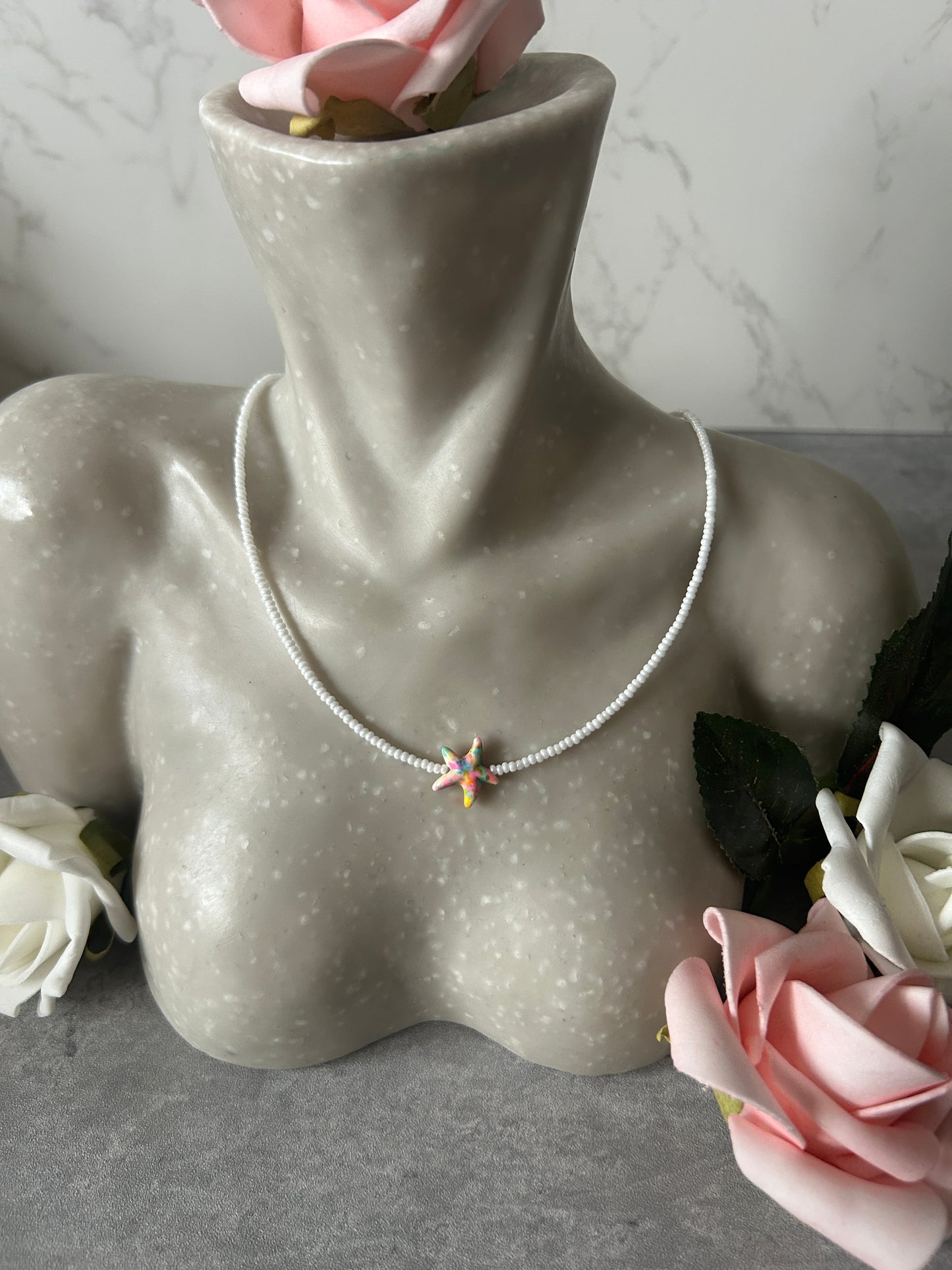 White Beaded Necklace with Colourful Star Pendant