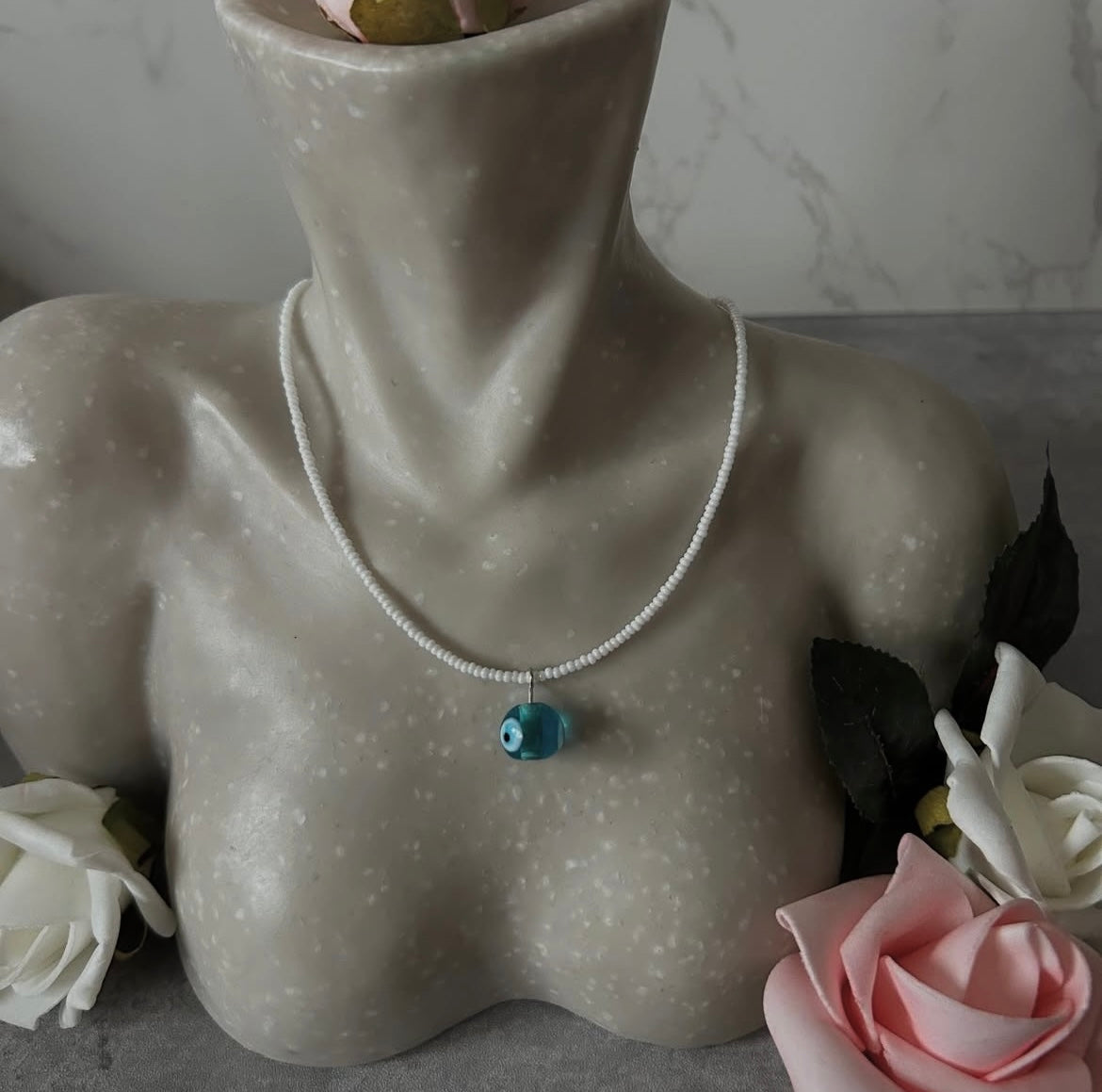 White Beaded Necklace with Evil Eye Pendant